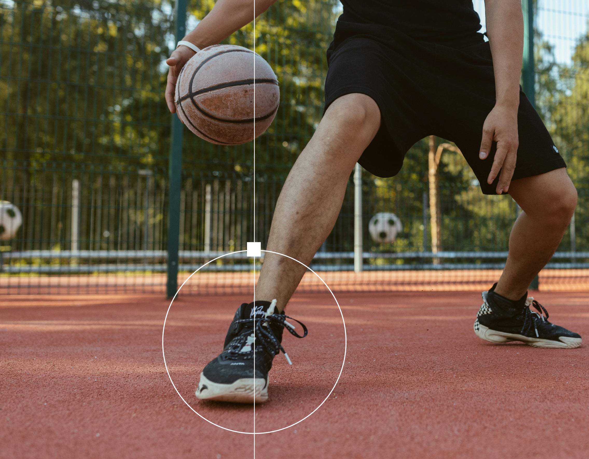 Person playing basketball on outdoor court, mid-dribble, with focus on foot positioning and ball control