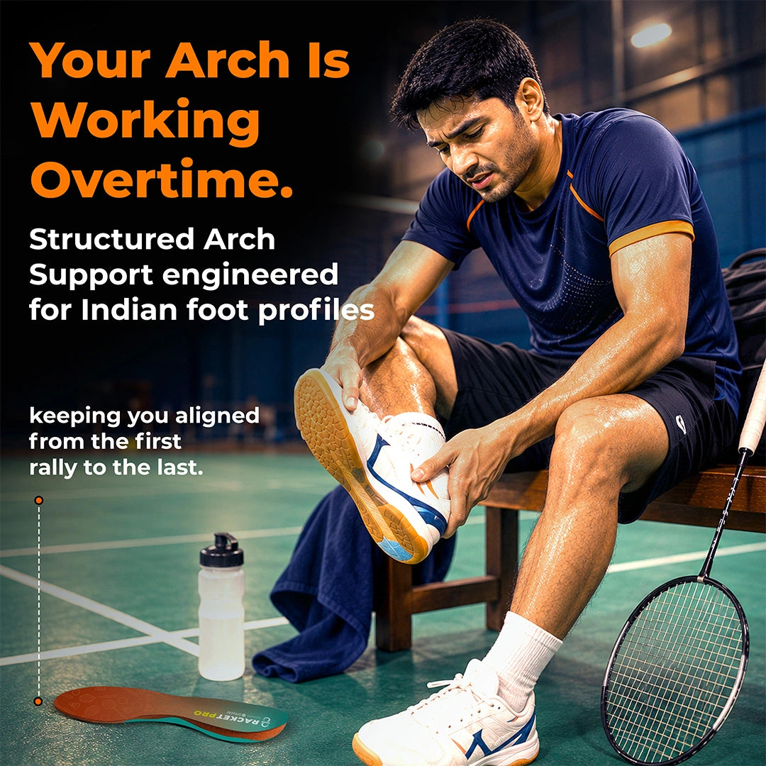Player resting courtside holding his foot; Racket Pro structured arch support for Indian foot profiles